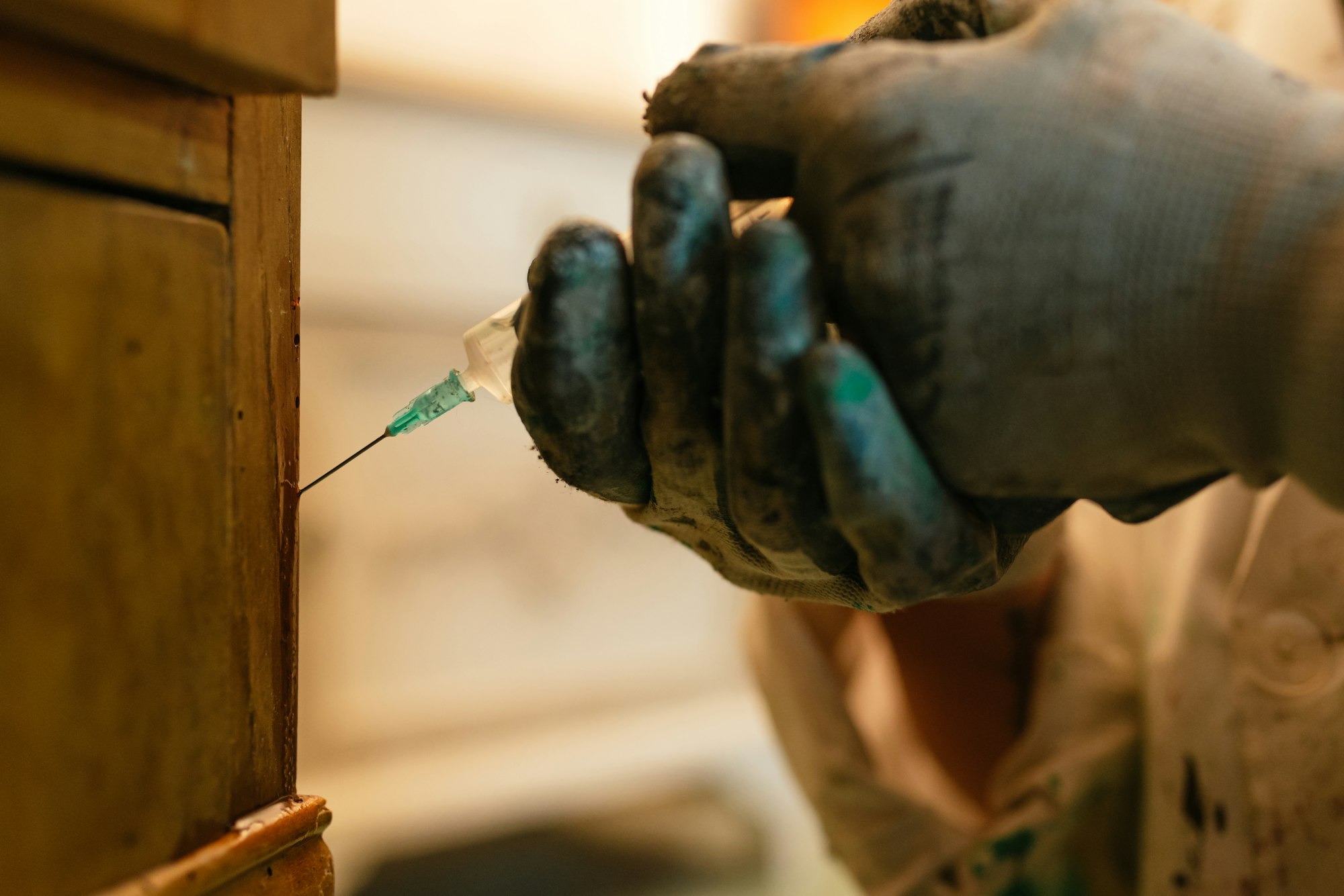 applying product against woodworm