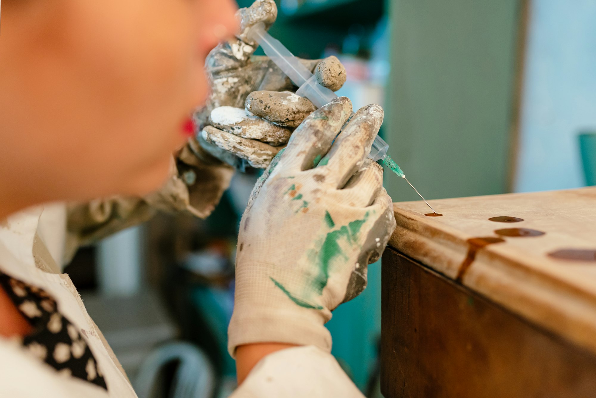 applying product against woodworm