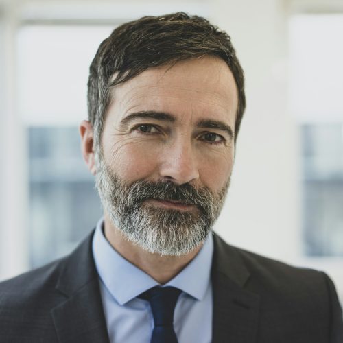 Portrait of confident mature businessman in office